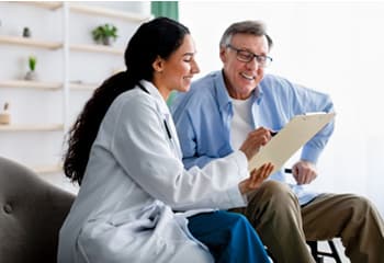 Healthcare professional reviewing medical equipment inventory in a hospital supply room